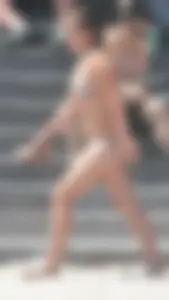 Bunch of sexy babes at the beach in bikinis