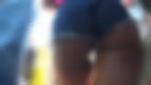 Sexy black milf walking with a great ass in short jean shorts showing her ass cheaks