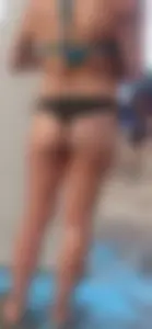 Beach shower milf in semi thong bikini with a nice ass