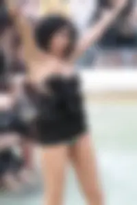 Fountain girl in a skirt accidentally shows her tits and panties