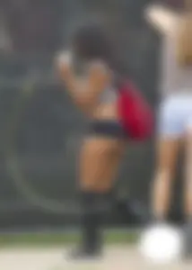 Sexy black teen hula hoop girl in tiny black shorts showing her cheeks