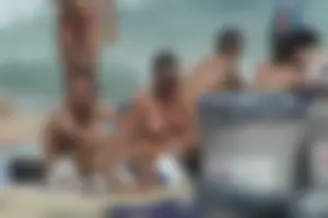 Topless girls on a beach in Barcelona