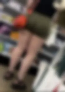 Juicy brunette in green spandex shorts OC