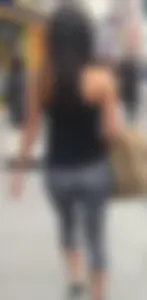 Sexy girl walking in grey patterned leggings with friend in tight jeans