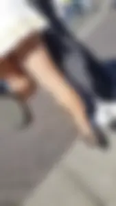 Girl in a Dress And Pantyhose Lifting Her Leg on the Street Creepshots Gallery