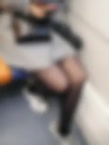 Cute Redhead in Black Pantyhose Sitting in Public Train Candid Photos