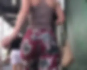 Subway girl with a nice jiggly ass in floral pattern pants