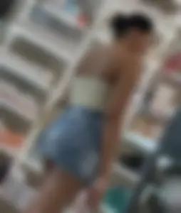 Extremely Hot Latina in Mini Skirt Showing Big Cheeks