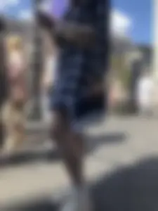 Nice legs of a candid girl crossing the street