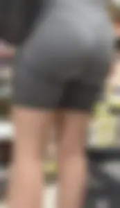 Beauty blonde in tight shorts with juicy fat ass