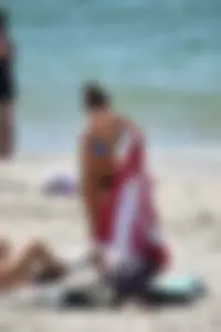 Sexy ass girl with a perfect body in her bikini on the beach