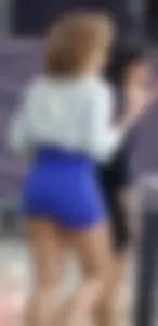 Mixed race woman in spandex shorts outfit