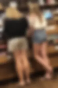 Blonde in jean shorts at the barrel or crackers