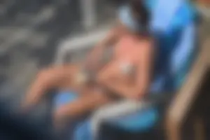 Creepshots of a neighbor milf in a bikini while sunbathing