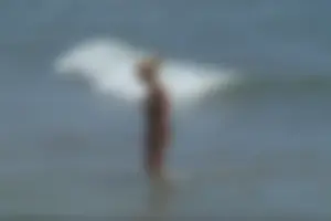 Girls on a nude beach in Sitges, Spain