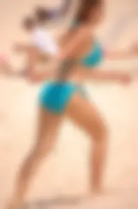 Assortment of sexy babes at the beach in bikinis