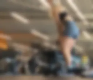 Cute gym blonde with orange hair ribbon