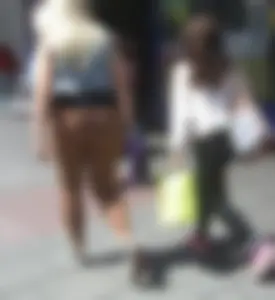 Thick blonde showing her panties in see through leggings