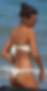 Hot girl at the beach with a nice ass in a white bikini
