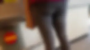 Nice ass checking out in leggings at a grocery store