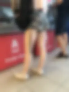 Candid Girl With Nice Skinny Legs in Shorts at the ATM Photos