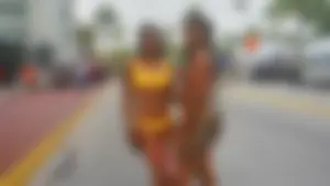 Two sexy ass black girls in thongs posing for the camera