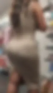 Busty chick with big ass in a tight dress
