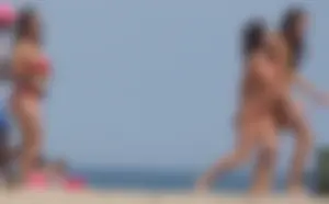 3 sexy girls on the beach in bikinis