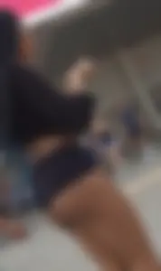 Ebony cheeks exposed in Biker Shorts