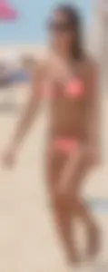 Girl in peach bikini on the beach with a great body and great ass