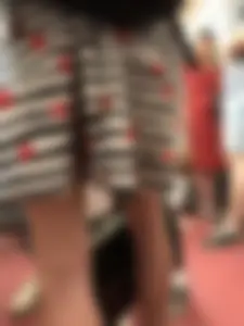 Girl in Striped Dress with Hearts Pattern Skinny Legs Subway Closeup Creepshot