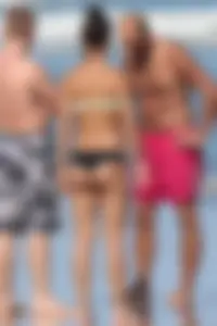 Beach girl out in a bikini with a nice round big booty