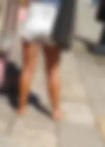 Nice girl in shorts in the morning