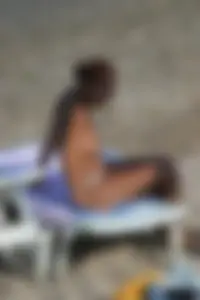 Beach voyeur girls in bikinis, thongs and topless