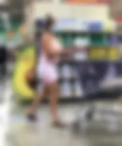 Thick Latina babe with a nice ass in tight patterned shorts