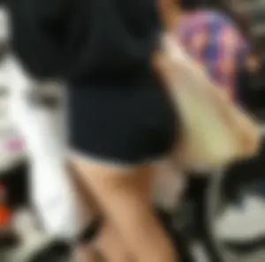 Sexy asian babe in all black outfit showing off the cheeks