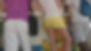 Milf in yellow shorts with vpl and a wedgie