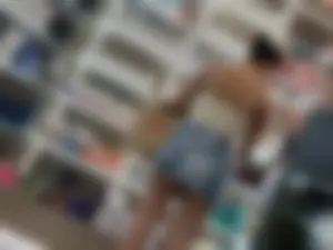 Extremely Hot Latina in Mini Skirt Showing Big Cheeks