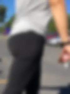 Blonde with a sexy round ass in tight leggings walking