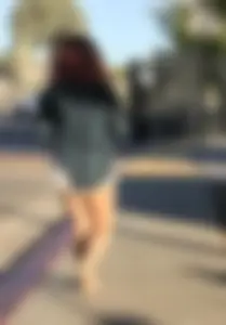 Big boobed redhead walking with no shoes and in shorts