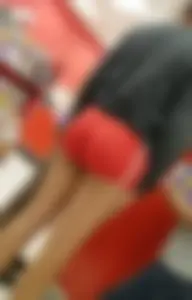 Sexy booty in red mini shorts at the store sneaky pics