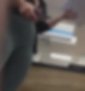 Green Lululemons Bent Over at Fedex