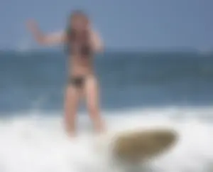 Candid surfer babes on the beach and in bikinis