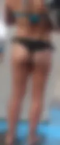 Beach shower milf in semi thong bikini with a nice ass