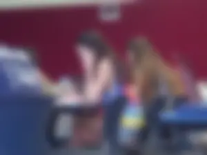 College girl in class showing sideboob with no bra on