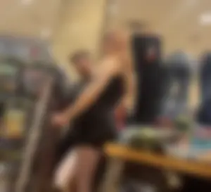 Redhead goth girl  in fishnets + tight dress