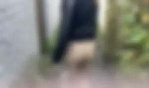Girl in tight pants walking down a narrow suburban street creepshot, big hot ass