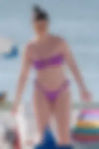 Pale chick in tiny purple thong