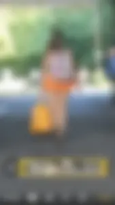 Chubby Candid Girl in a Short Orange Skirt Street Creepshots, Her Butt Cheek Slightly Visible