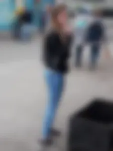 Smoking Girl in Tight Skinny Jeans Candid